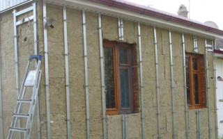 Утепление стен дома под сайдинг: требования к материалам, технология монтажа утеплителя